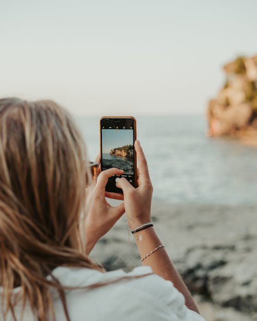 Gratis lagerfoto af hav, kvinde, lodret skud