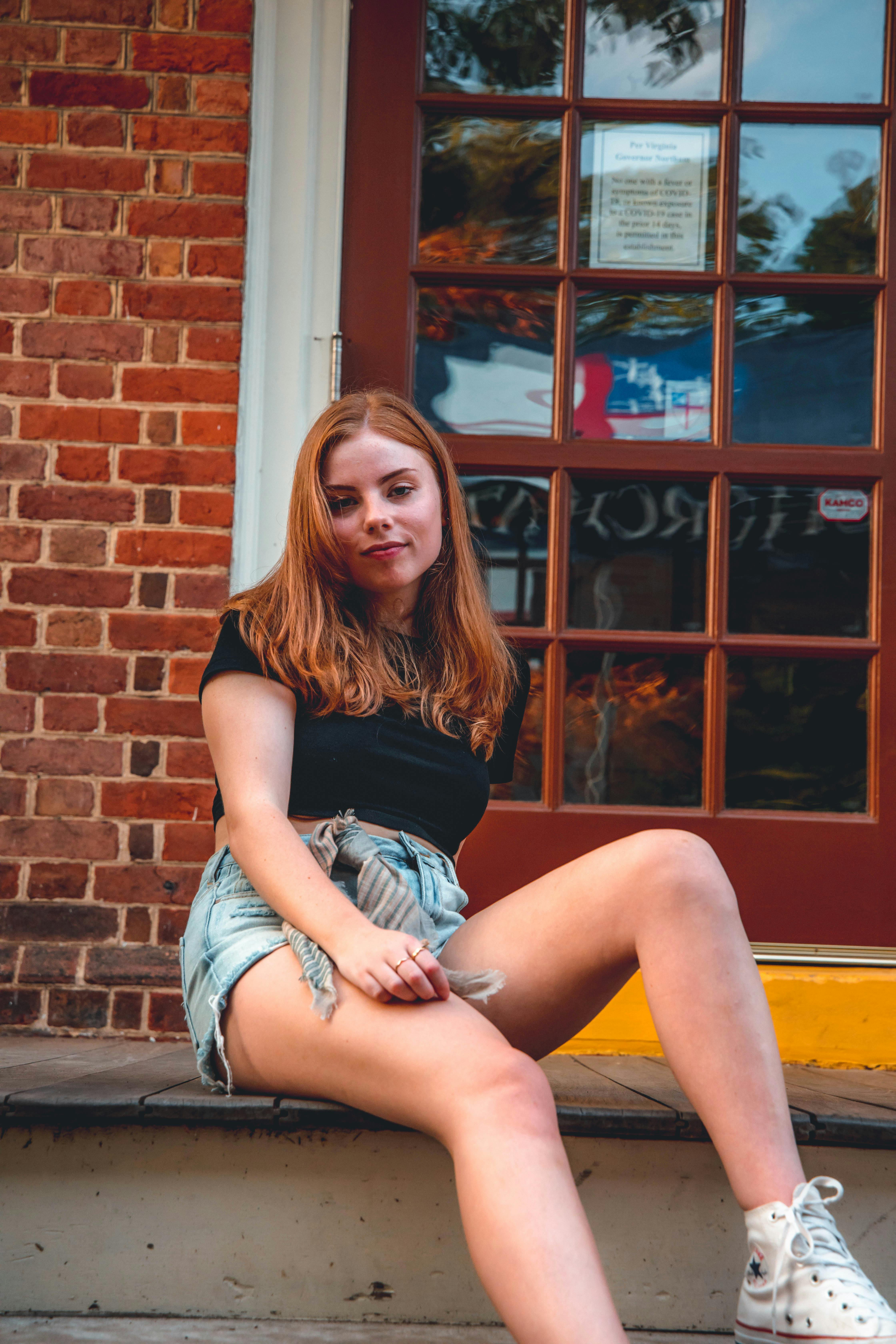 woman sitting at entrance