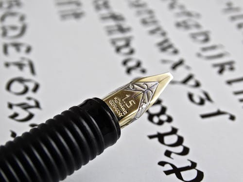 Free Black and Gold Pen Stock Photo
