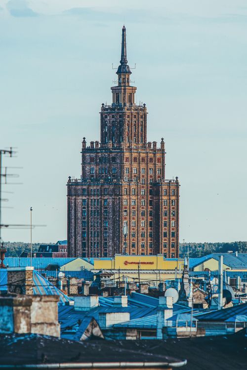 Free Majestic view of the iconic Academy of Sciences building in Riga, Latvia, standing tall under a clear sky. Stock Photo