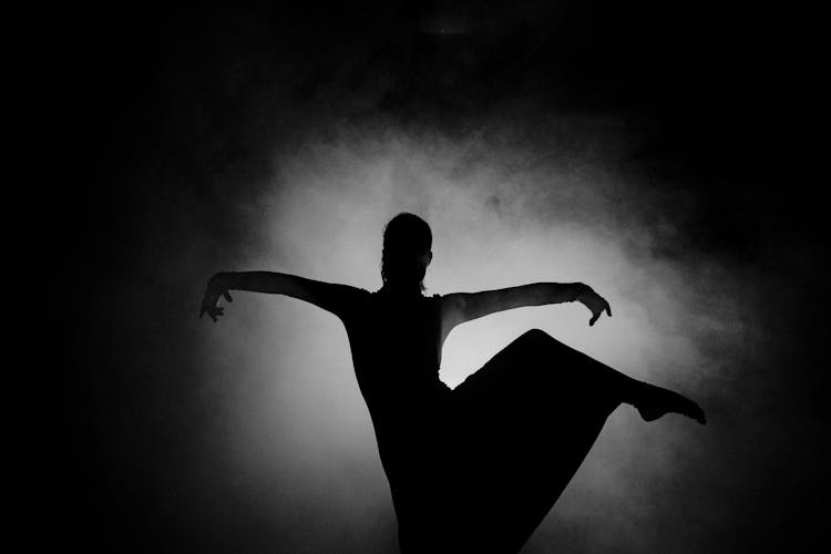 Silhouette Of Person Dancing