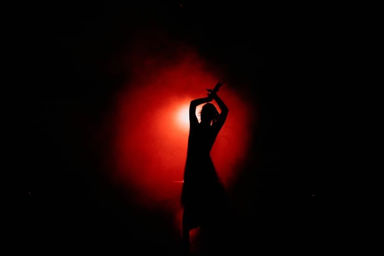 Silhouette Of Person Dancing