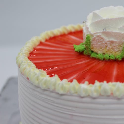Close-up Shot of a Cake with Icing