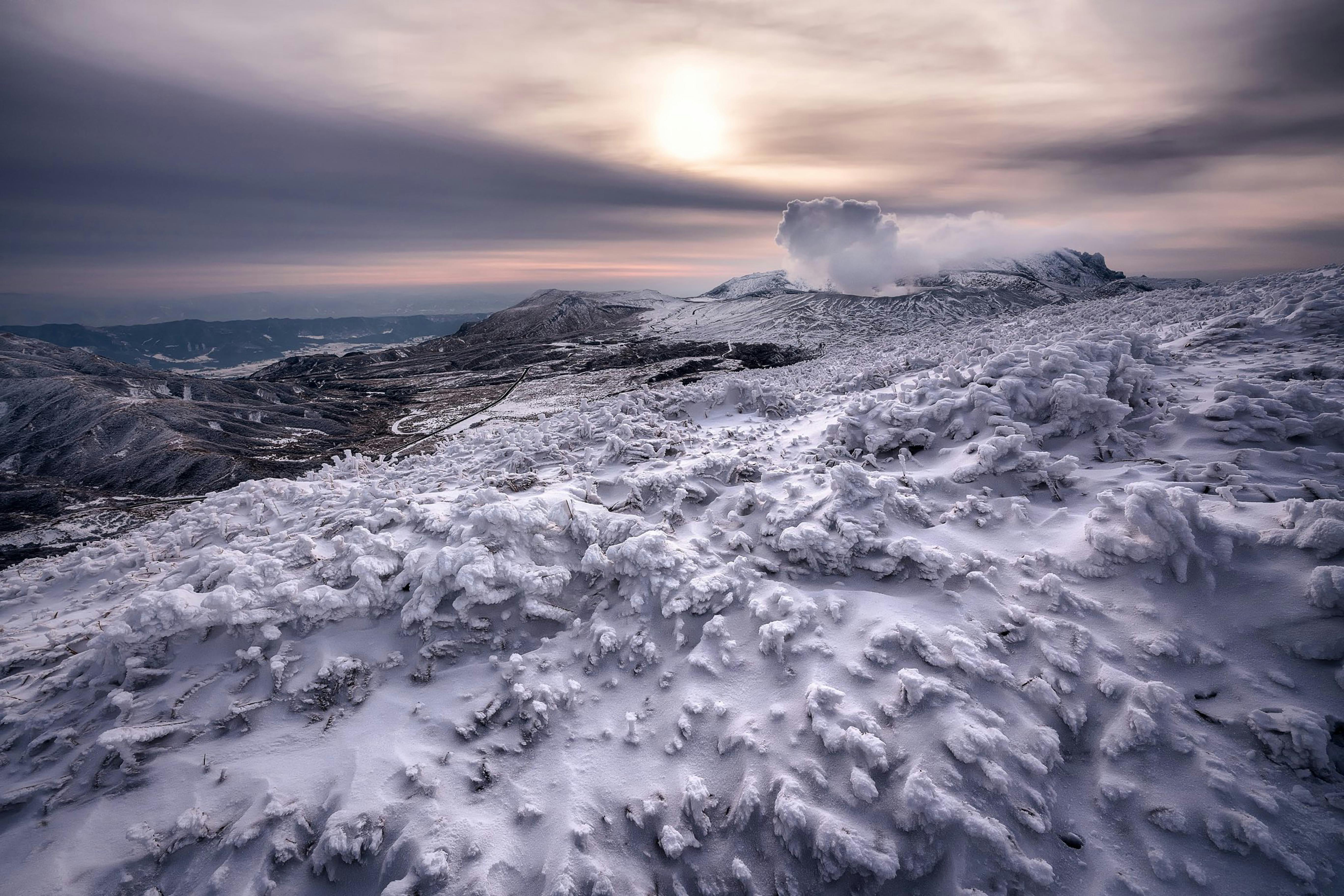 rocky rough terrain covered with snow