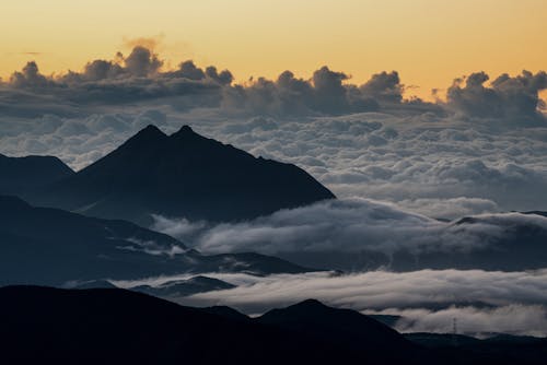 Mountains Covered in Clouds at Dawn