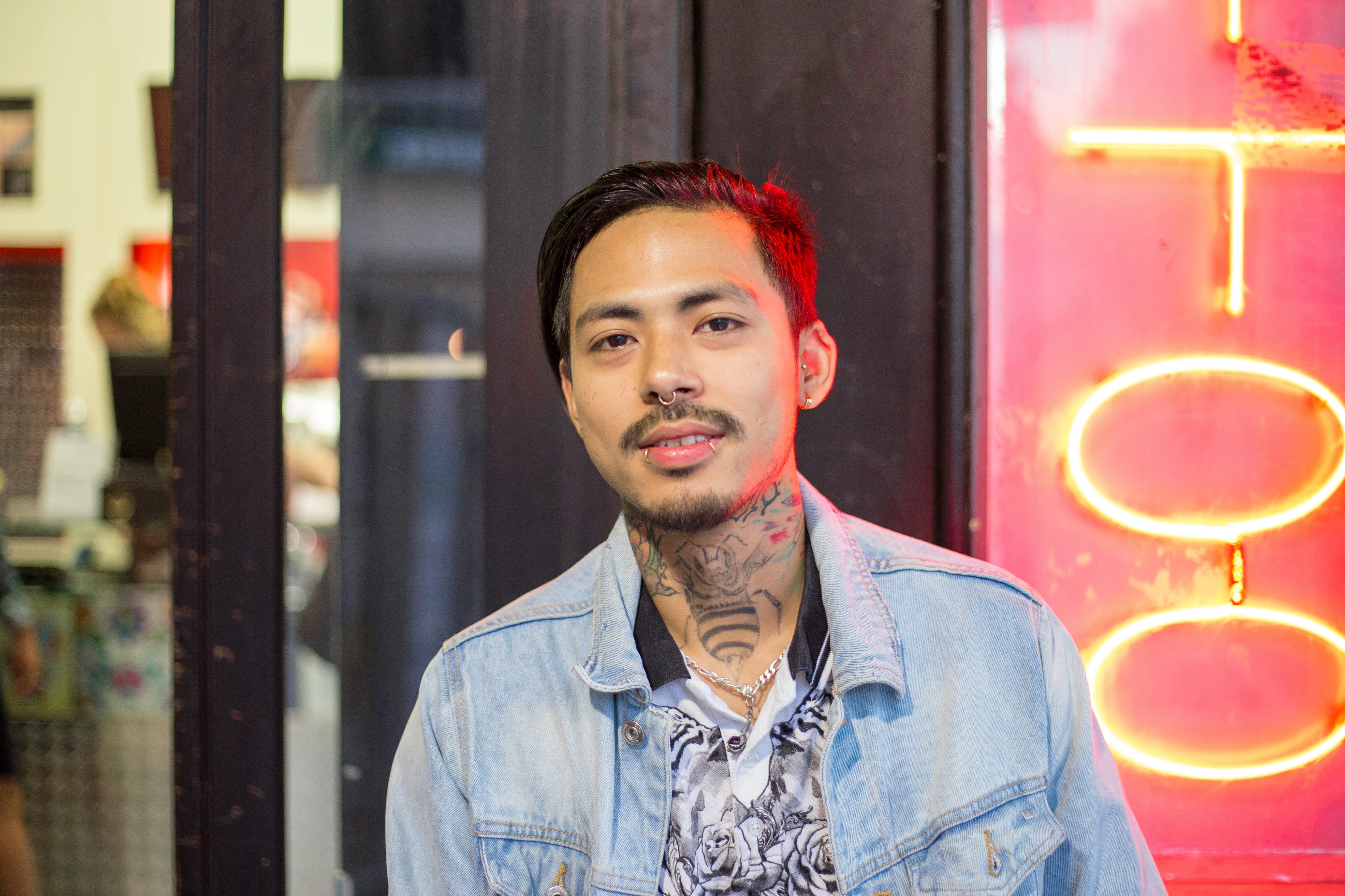 Man with Piercings and Tattoos · Free Stock Photo