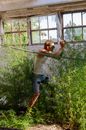 Man Photographing in an Abandoned Building 