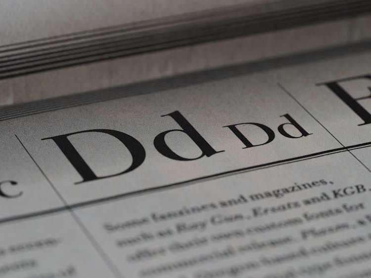 D Letters In Newspaper