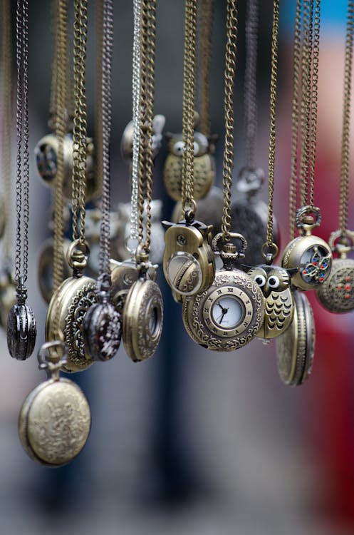 Free Assorted Gold Round Pocket Watches Stock Photo