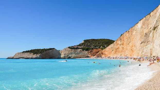 Enjoy the stunning cliffs and turquoise waters of Egremni Beach, Greece, perfect for a summer getaway.