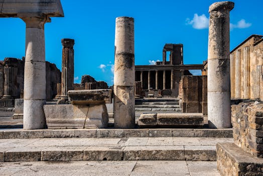 Explore the well-preserved ruins of ancient Pompeii featuring classic stone columns.