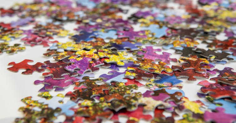 Scattered Colorful Puzzle Pieces