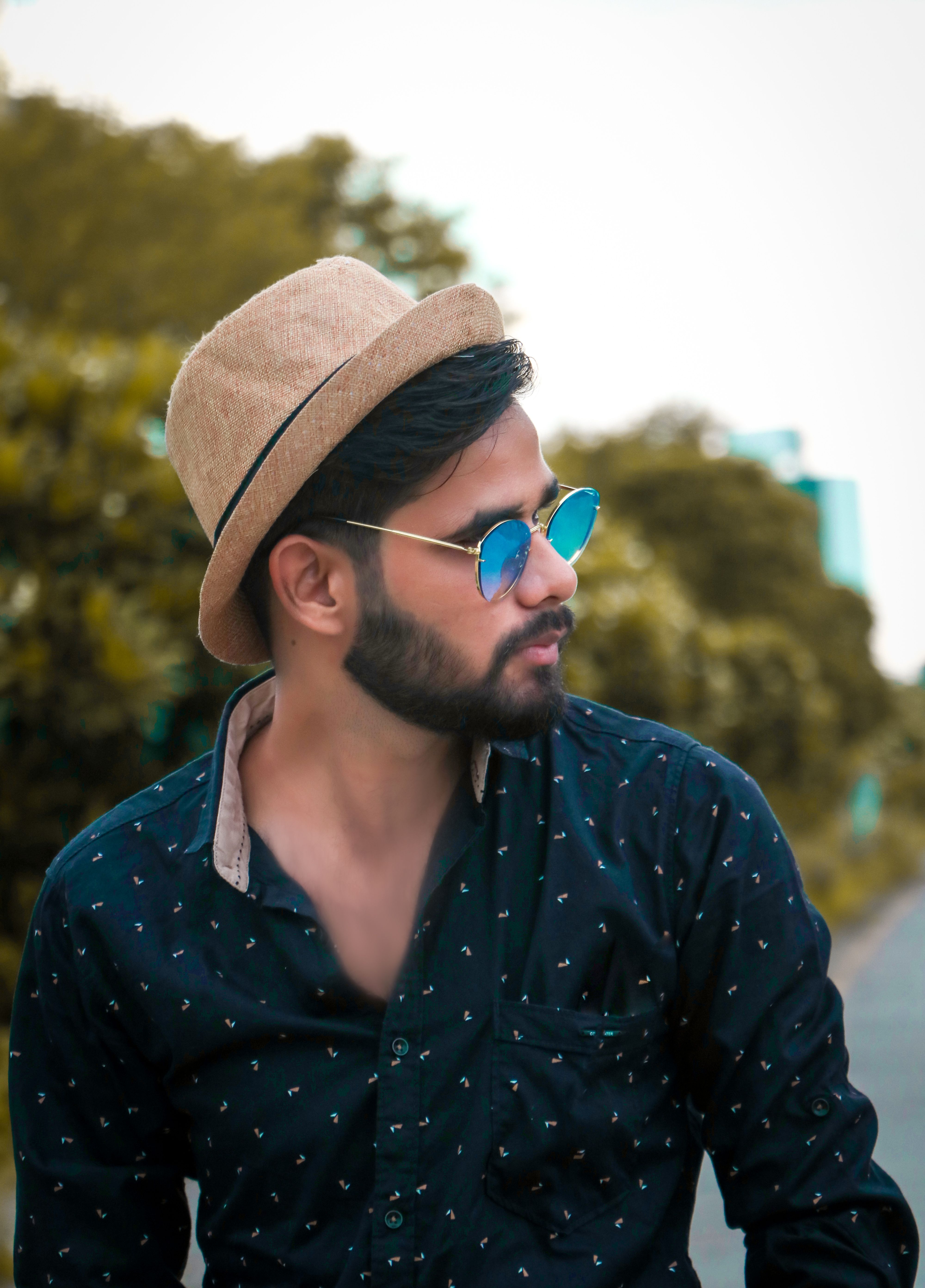 Man in Blue and White Polka Dot Dress 