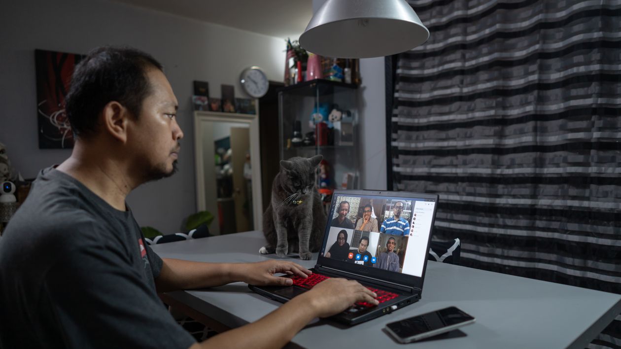 A Man Having an Online Meeting · Free Stock Photo