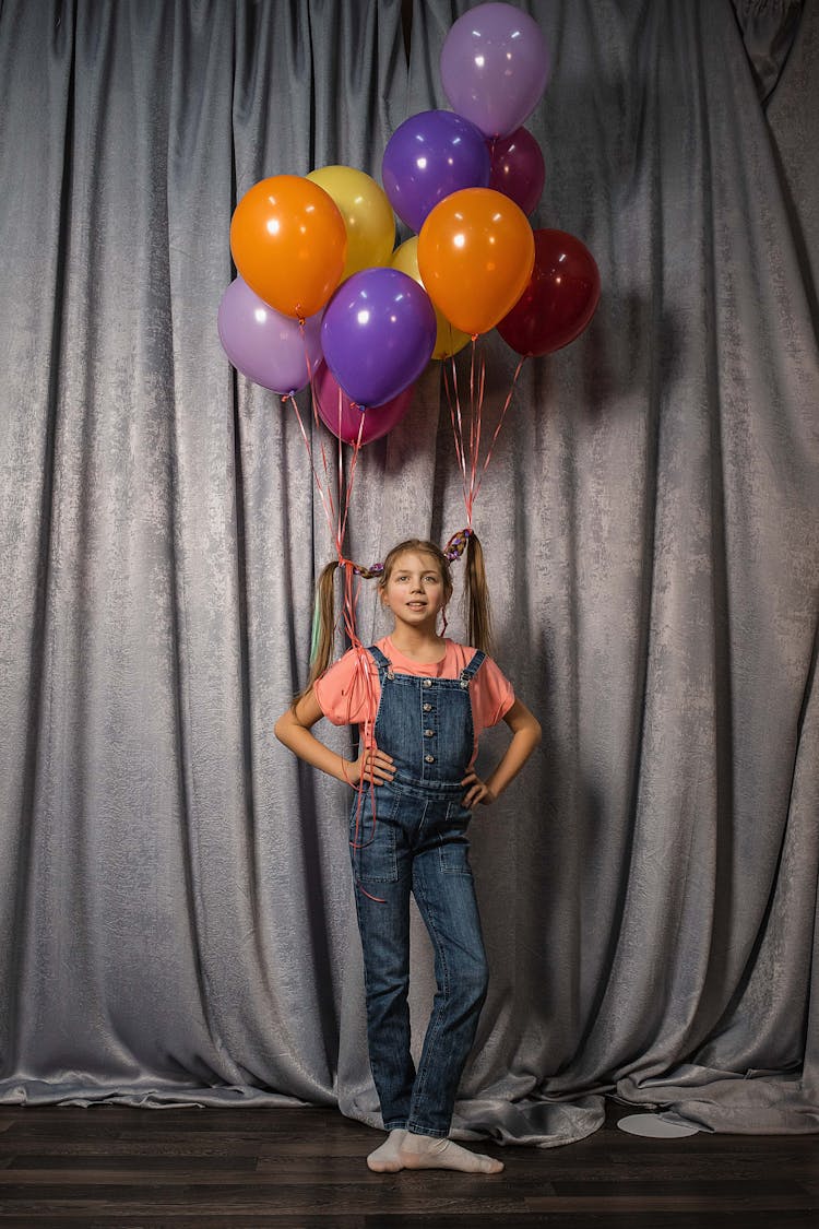 Funny Child With Balloons On Birthday Party