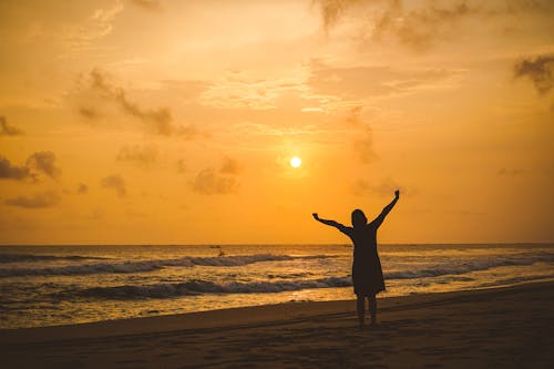 Silhouette of a Person at the Beach