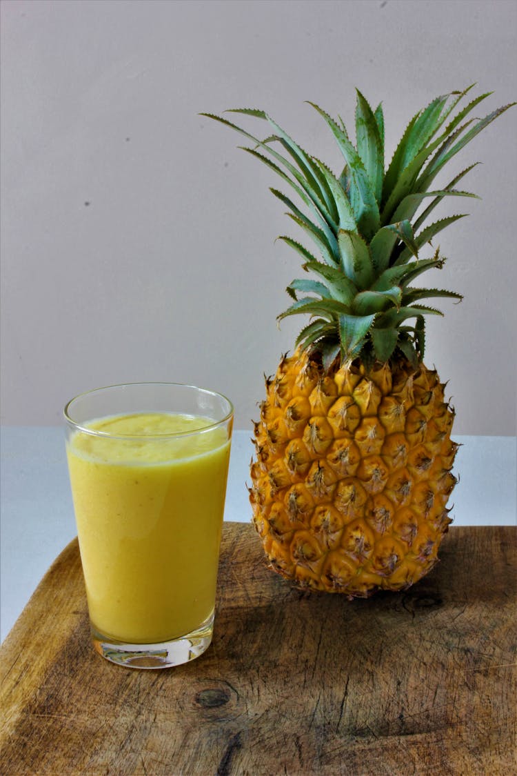 Pineapple Juice In Clear Drinking Glass