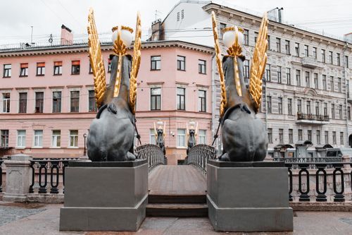 Free Golden-winged griffin statues on a bridge in Saint Petersburg. Stock Photo