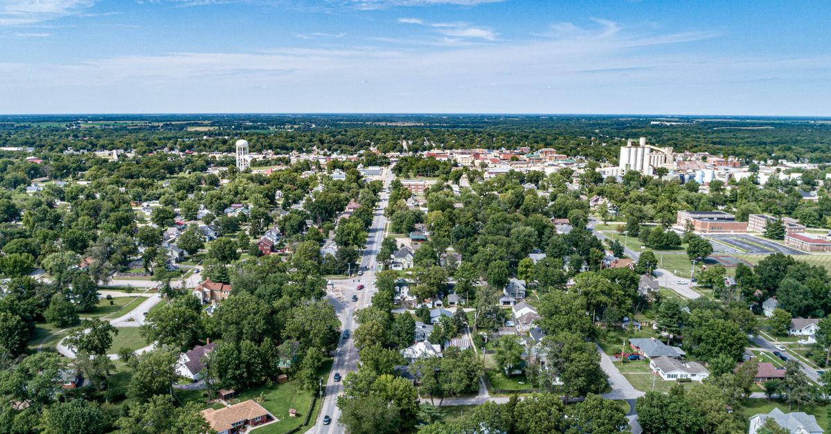 Explore the scenic suburban landscape of Mexico, Missouri from an aerial perspective.