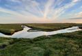 Salt marsh at sunset — photo by Dinah-Ann Lendzian on Pexels