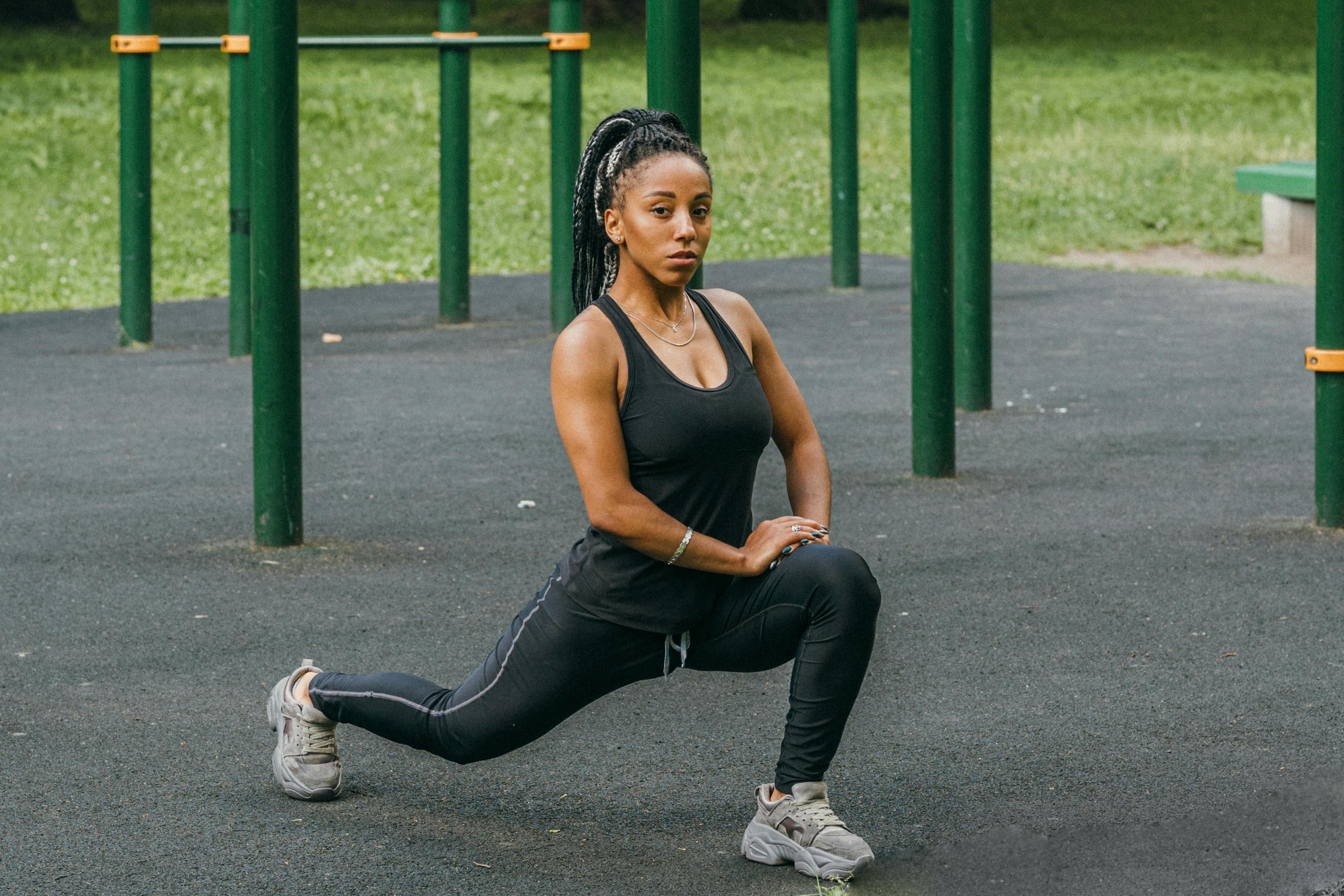 Person in Black Leggings Doing Leg Exercise with a Resistance Band
