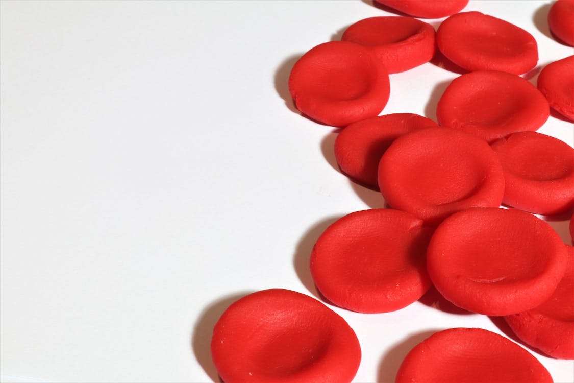 Free Red Bloodcells on White Surface Stock Photo