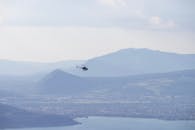 Helicopter flying over coastal river