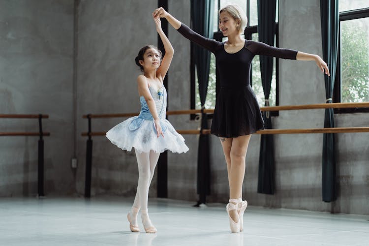 Ballet Teacher Dancing With Girl