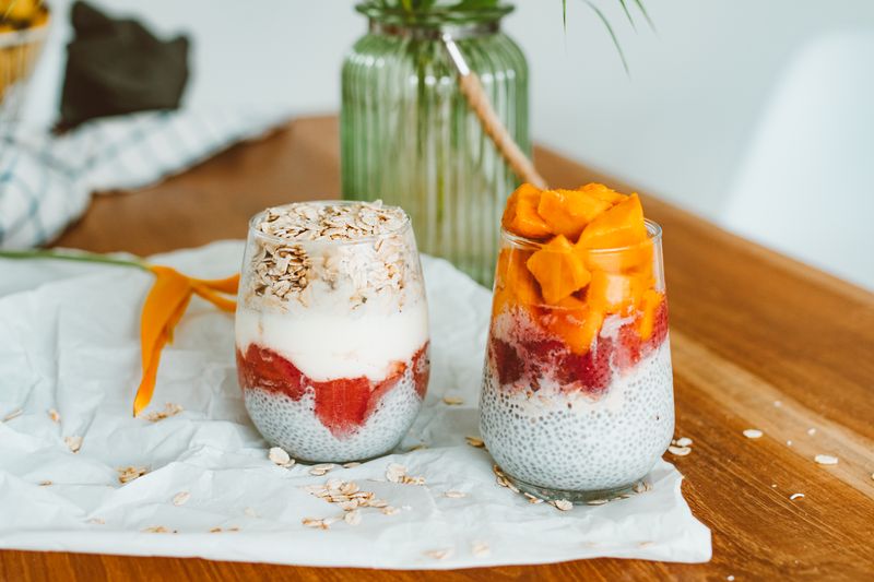 coconut mango overnight oats with toasted coconut flakes
