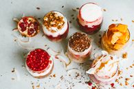 White and Red Ice Cream on Clear Glass Cups