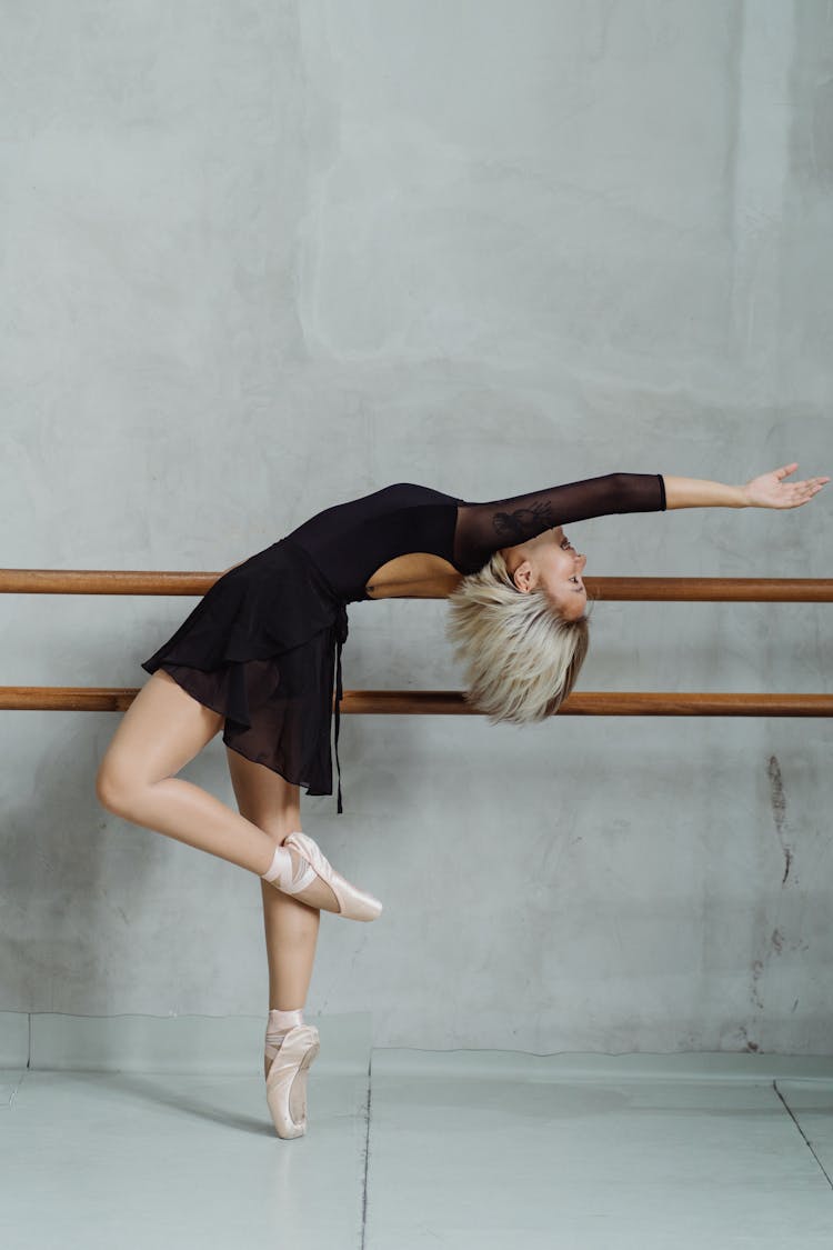 Photo Of Ballet Dancer Doing Warm Ups