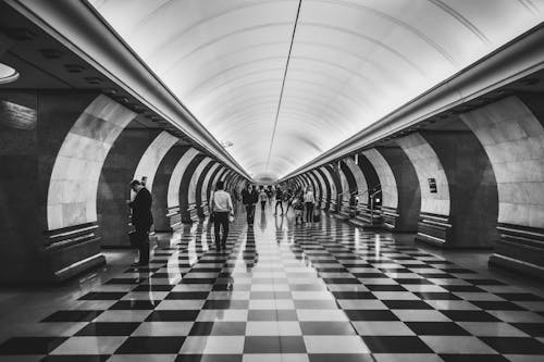 People on Platform in Metro Station in Black and White