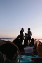 People Sitting on Brown Sand