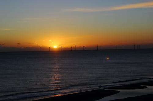 Oceaanwateren Bij Zonsondergang