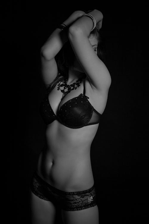 Free Woman in Black Brassiere and Panty Posing Stock Photo
