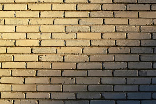 Kostenloses Stock Foto zu backsteinmauer, gebäude hintergrund, hintergrundbild