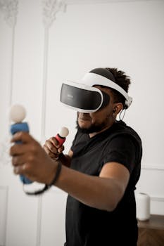 Adult man enjoying an immersive virtual reality gaming session indoors.
