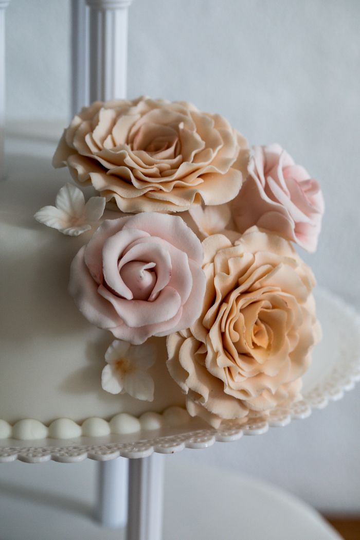 Hoorain Atelier wedding cake with sugar roses
