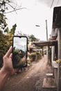 Person Taking a Photograph with a Phone