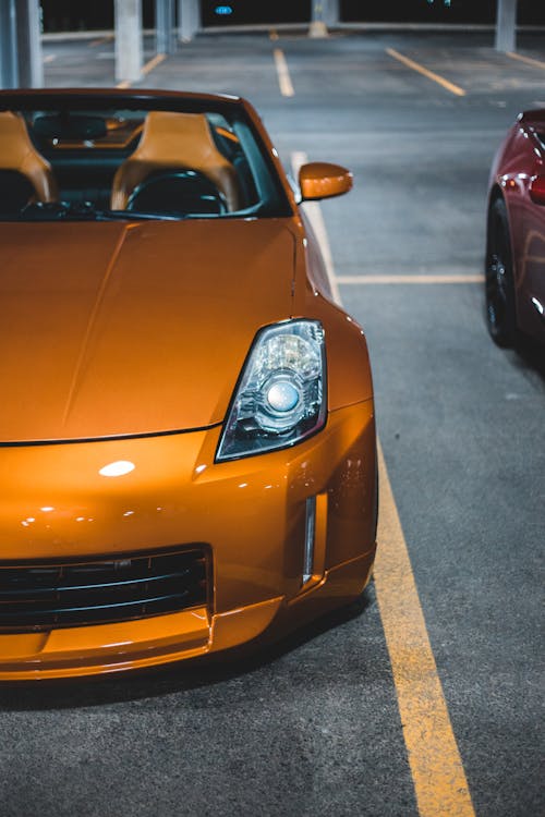 Shiny yellow luxury car at car parking