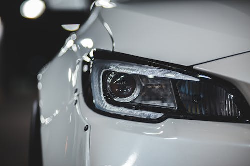 Shiny surface of new car with headlight