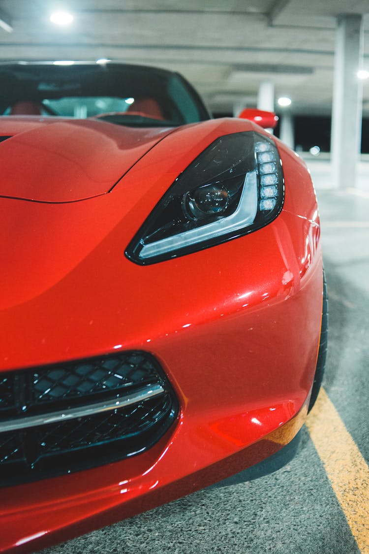 Red Luxury Shiny Car With Massive Headlights