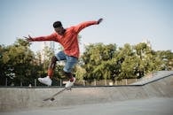 Man Jumping on a Skateboard