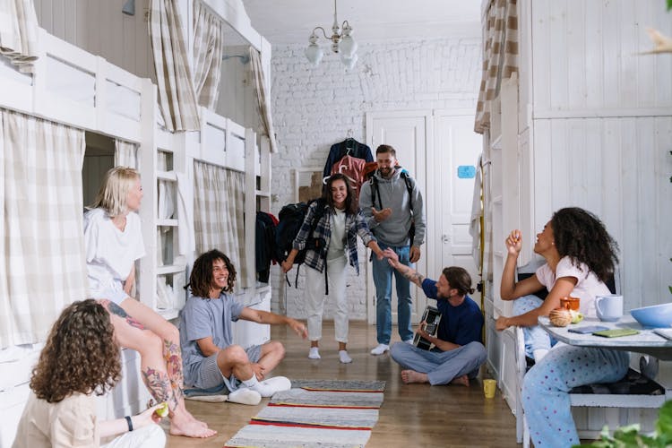 Friends Inside A Dorm Room