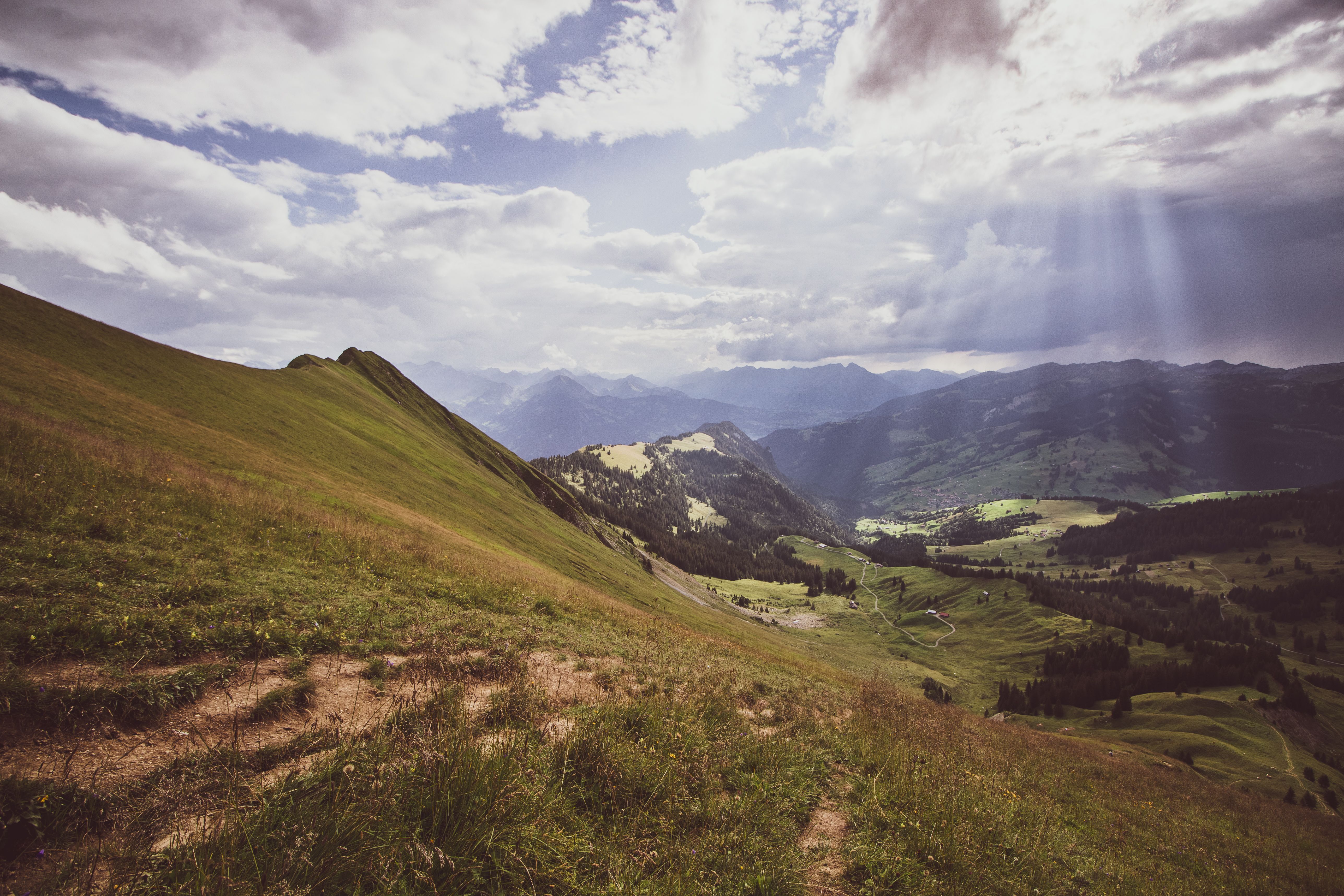 Explore the stunning alpine landscapes and rolling hills of Interlaken, Switzerland.