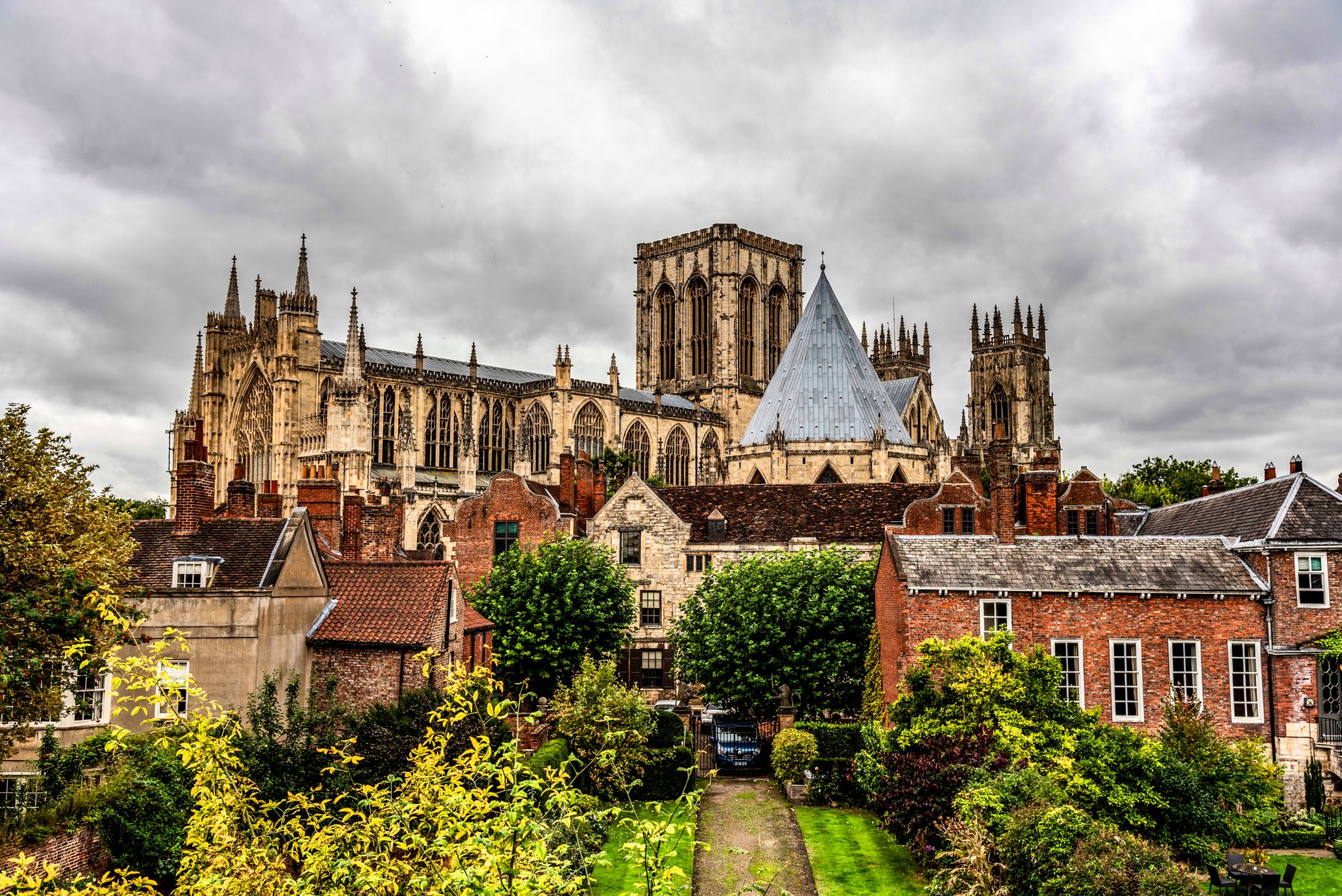 York Minster stands prominently against a cloudy sky in England, showcasing Gothic architecture