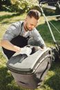 Man Mowing the Lawn
