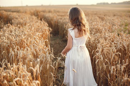 Woman in Dress on Field