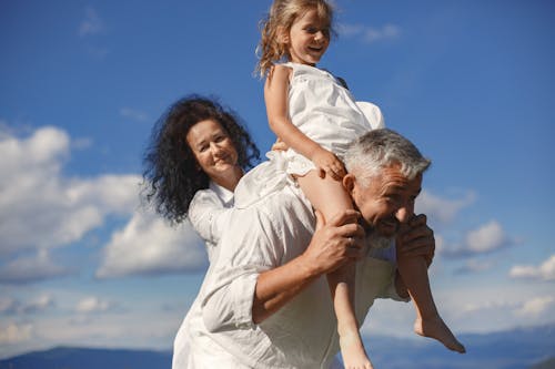 Free Grandparents with Their Granddaughter Stock Photo