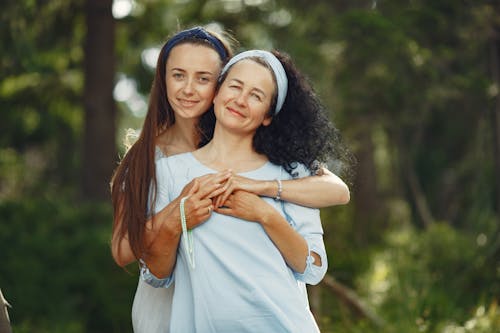 Free Woman Embracing her Mother Stock Photo